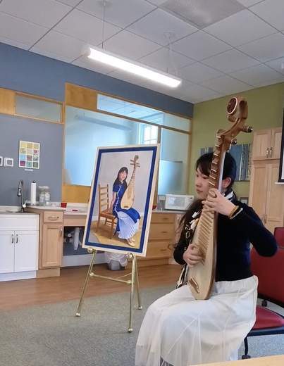 Instrument demonstration during a cultural outreach session